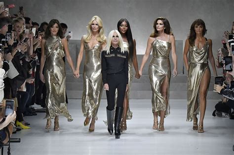 versace michael kors acquisition|who is versace owned by.